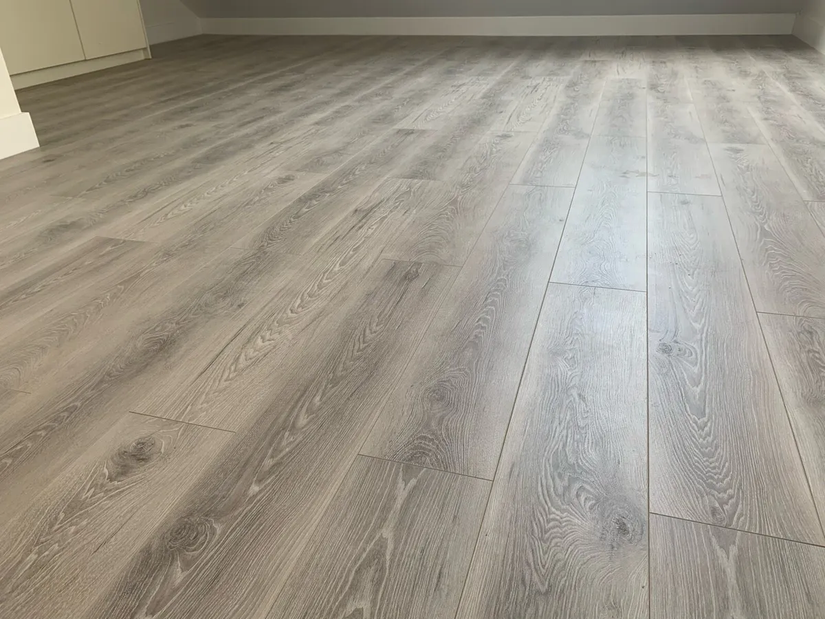 New AC4 Matt Finish Grey Laminated Floor - Image 1