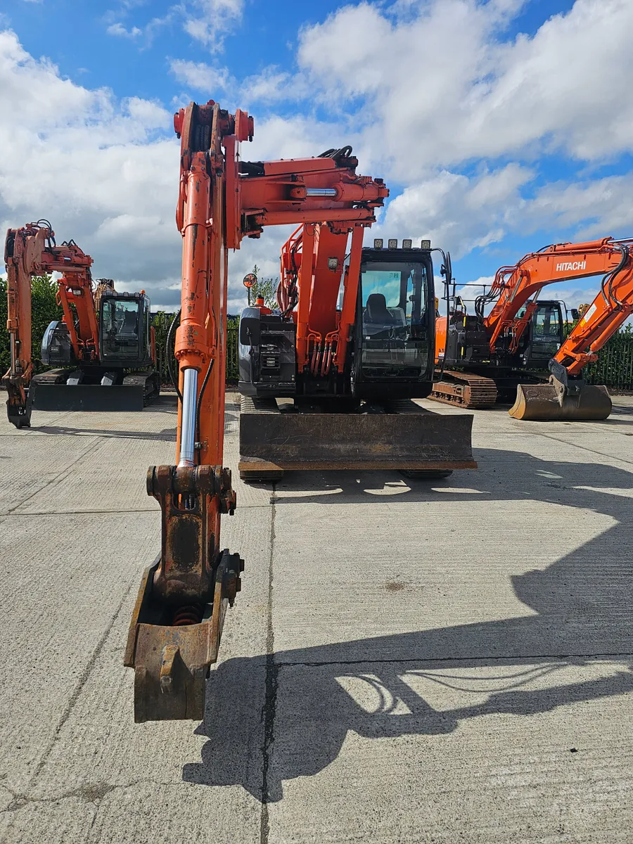 Off set boom excavator for self drive hire - Image 1