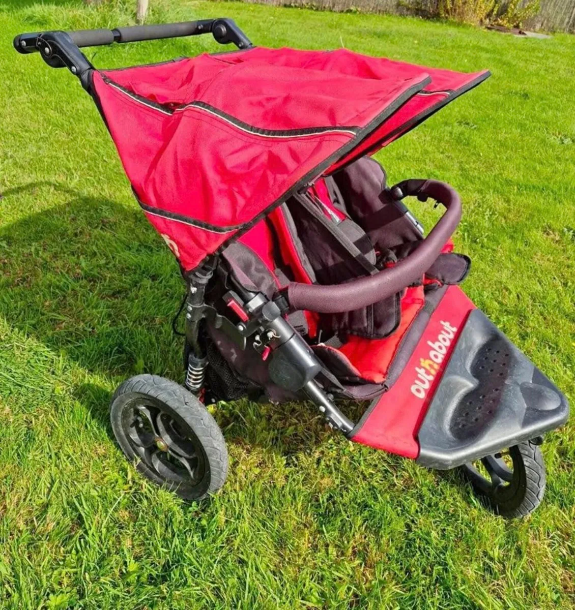 Out and about red double buggy for sale in Co. Tipperary for 175 on DoneDeal