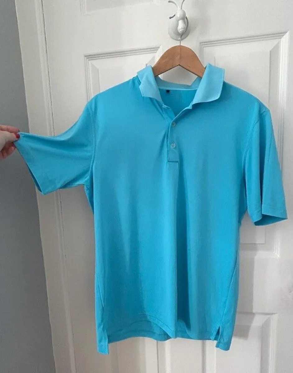 Adidas golf shirt sizing on sale