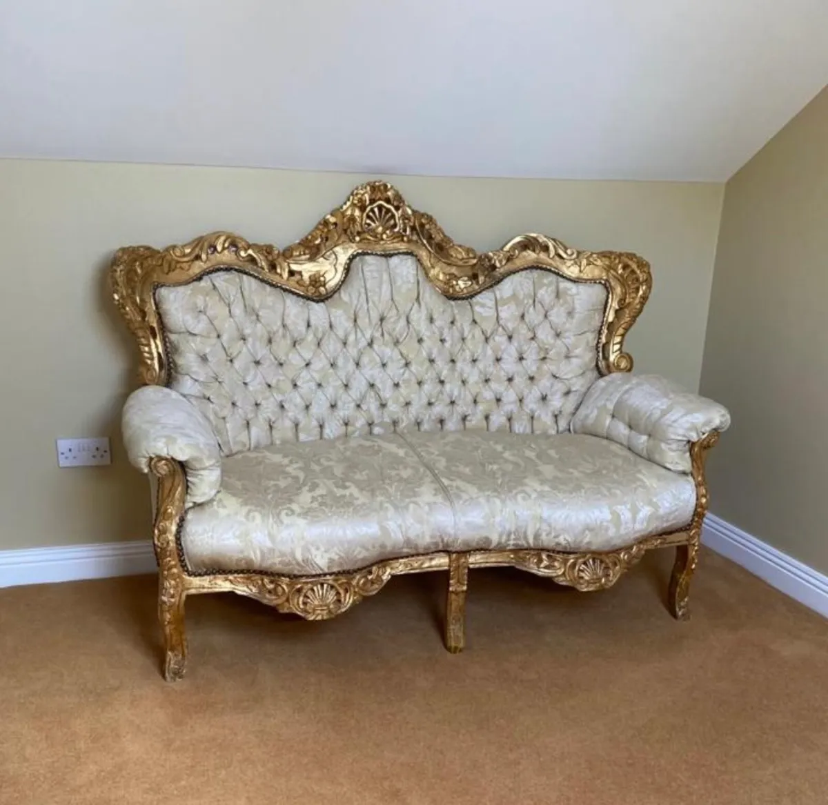 Antique gold leaf couch