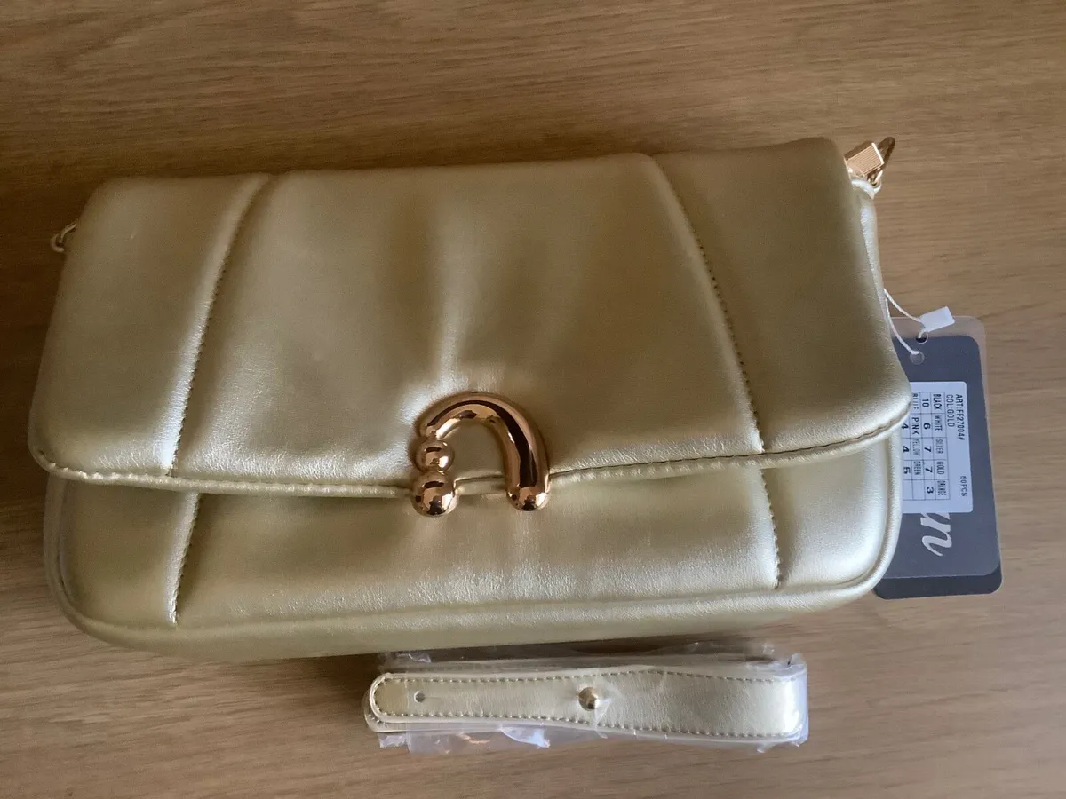 Gold clutch bag. 20 n post. for sale in Co. Donegal for 20 on DoneDeal