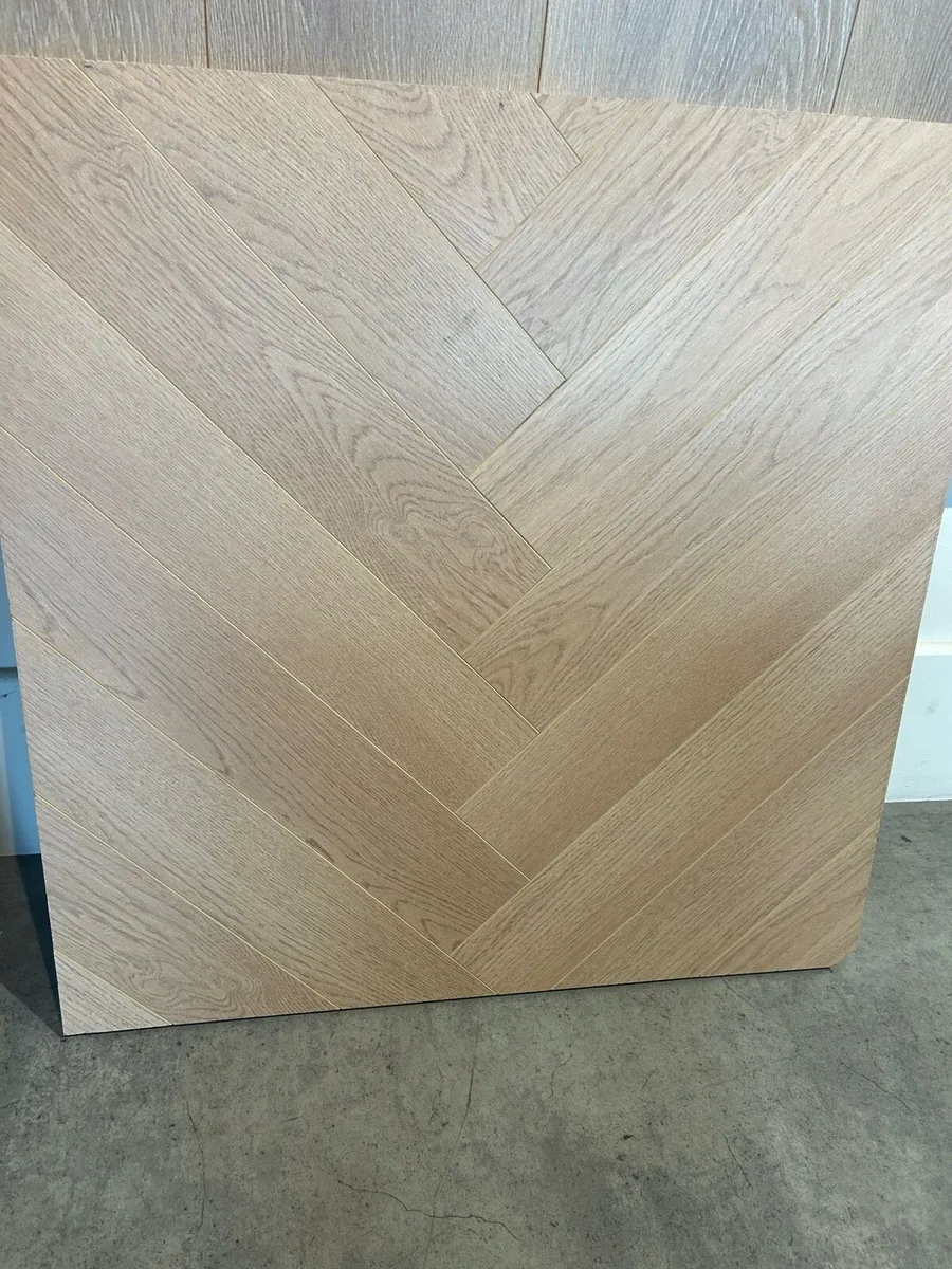 Herringbone laminate floor 12mm - Image 1