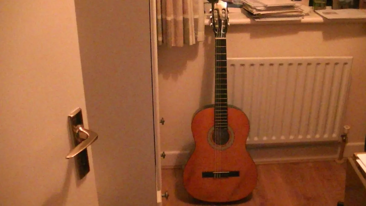 C.Giant Classical Guitar - Image 1