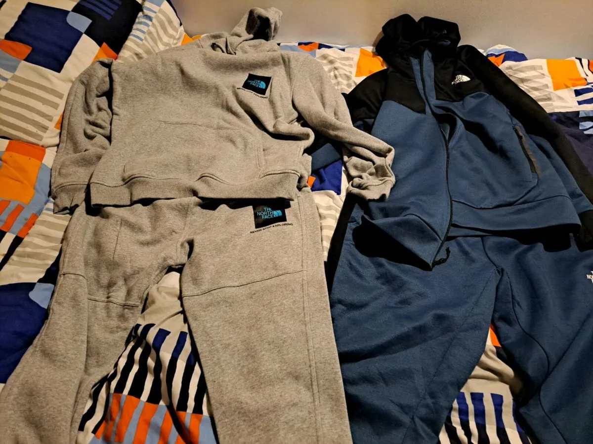 Two North Face Tracksuits 1 Blue 1 Grey