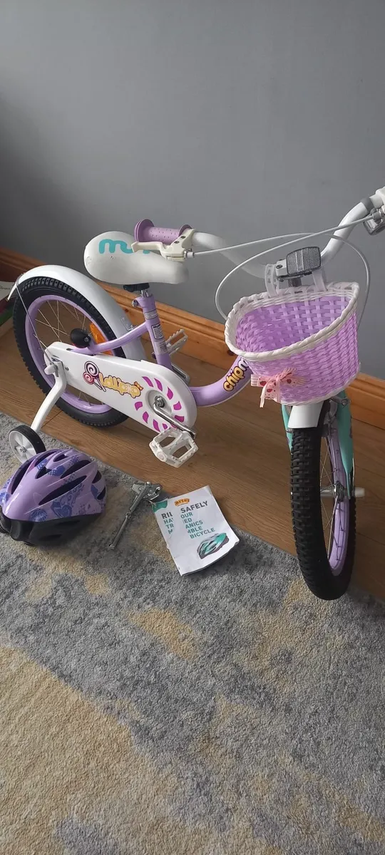 Girls 16inch bike + helmet - Image 1