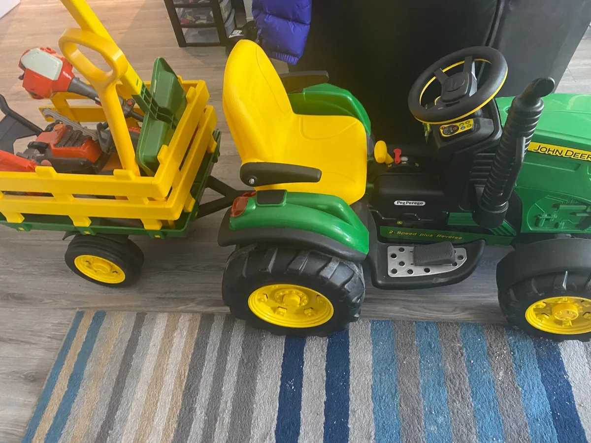 Battery operated john deere tractor clearance