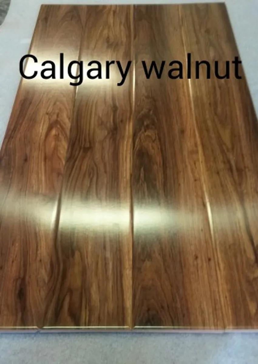 New High gloss 12.3mm Walnut &,Grey floor - Image 1
