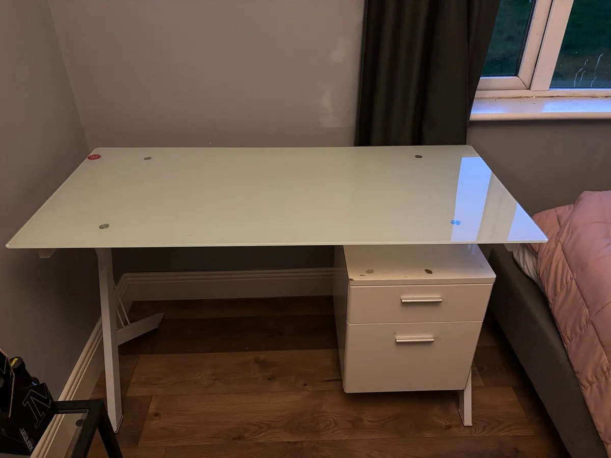 Glass desk with storage attached