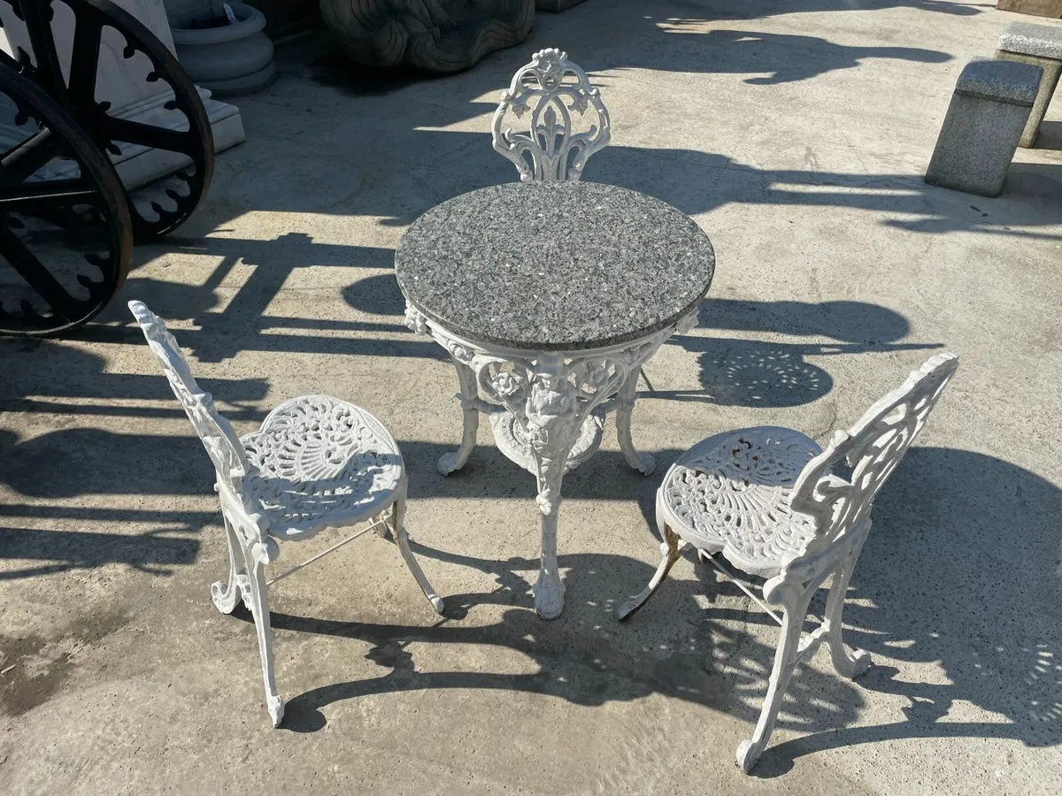 Antique cast iron patio set - Image 1