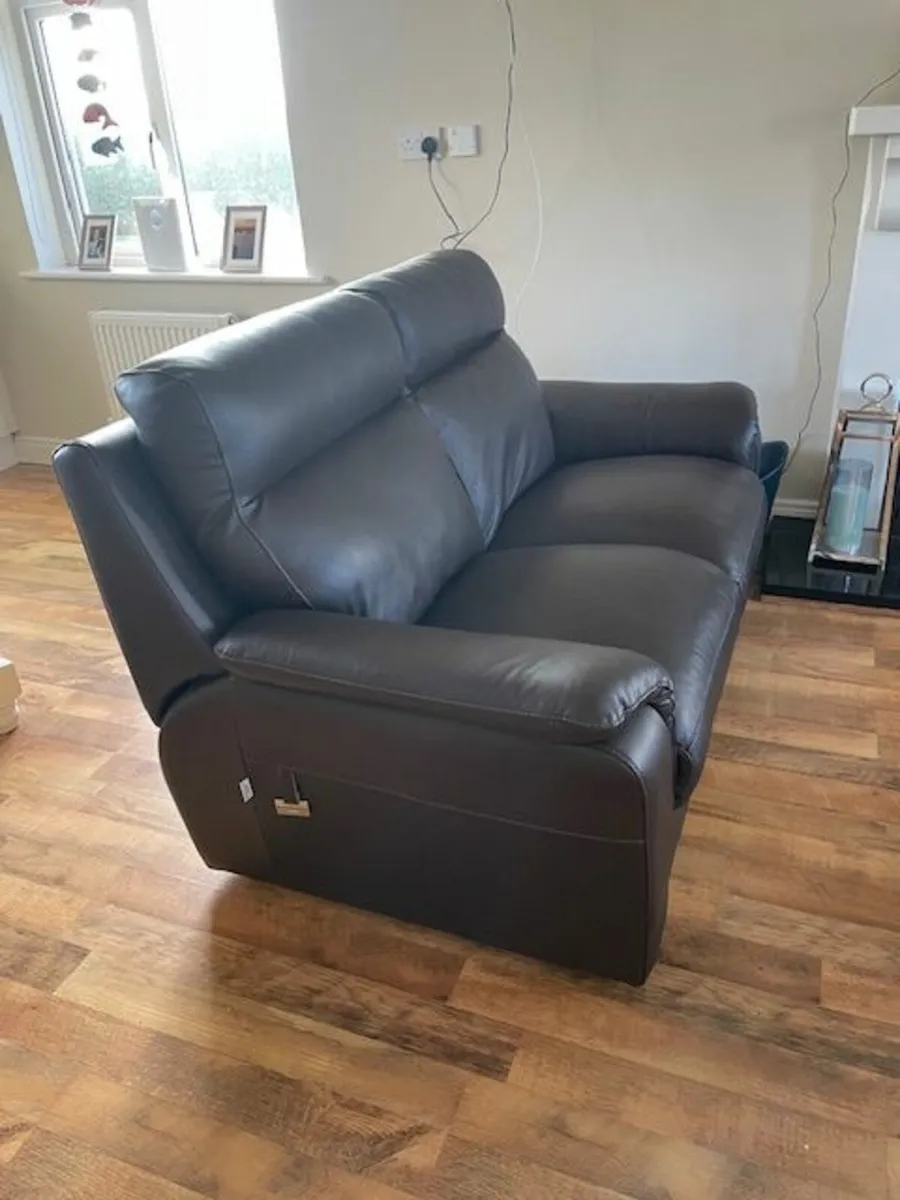 Leather sofa and footstool - Image 1