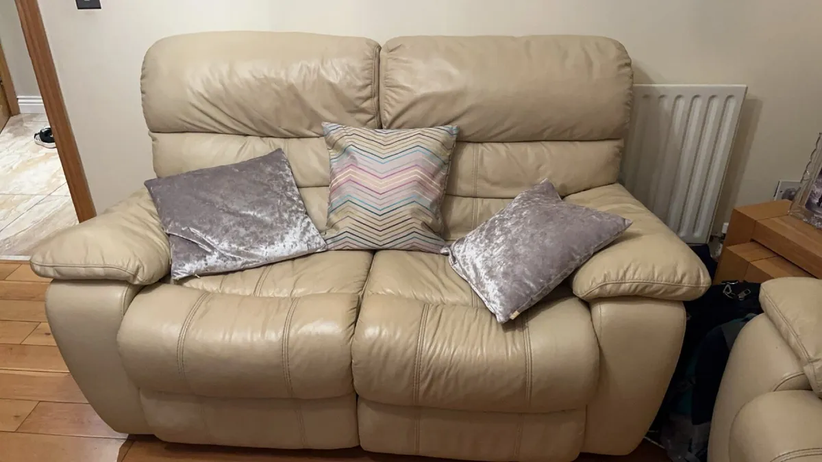 2 recliner cream leather sofas - Image 1
