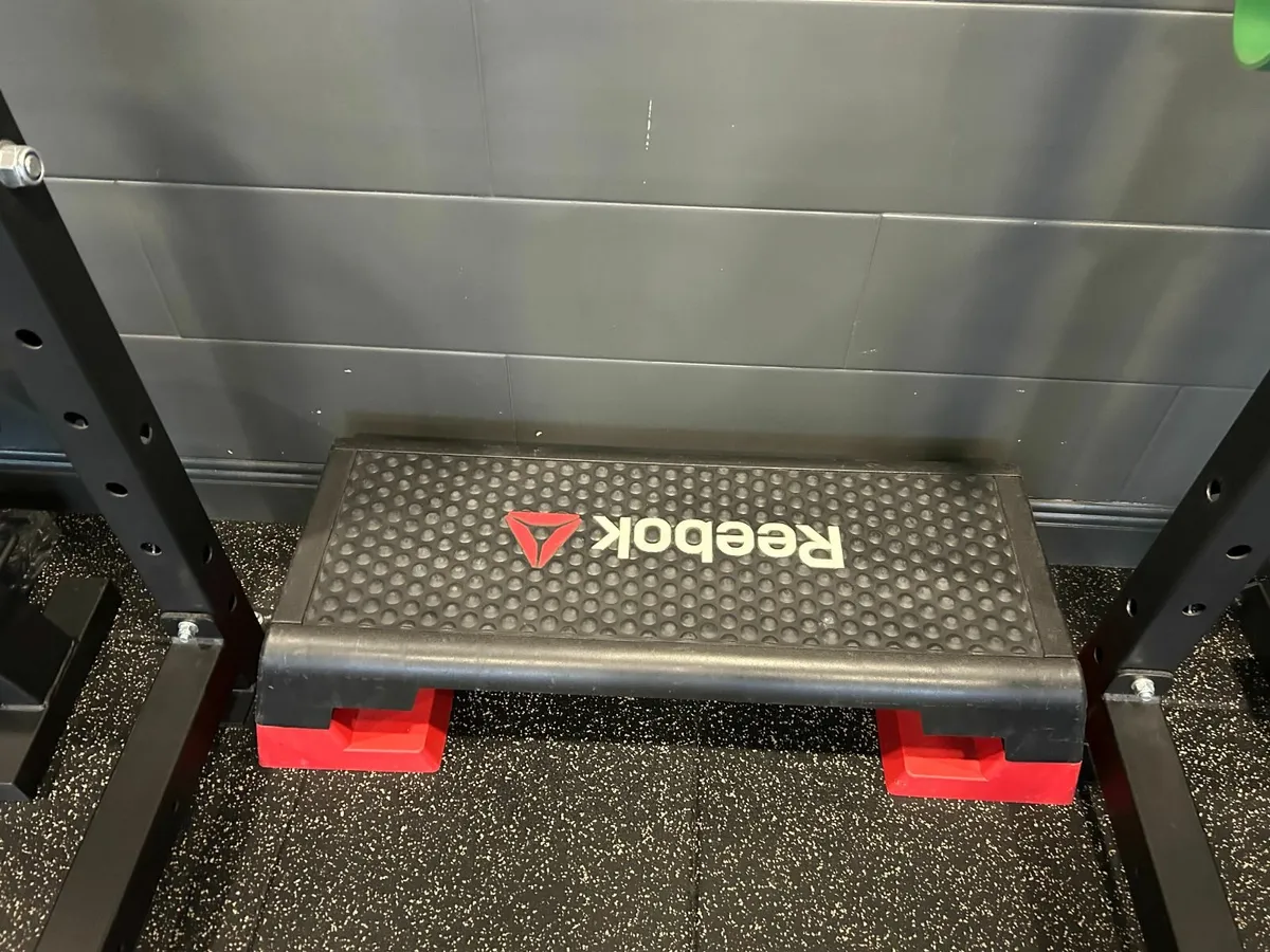 Reebok steps and Olympic bar