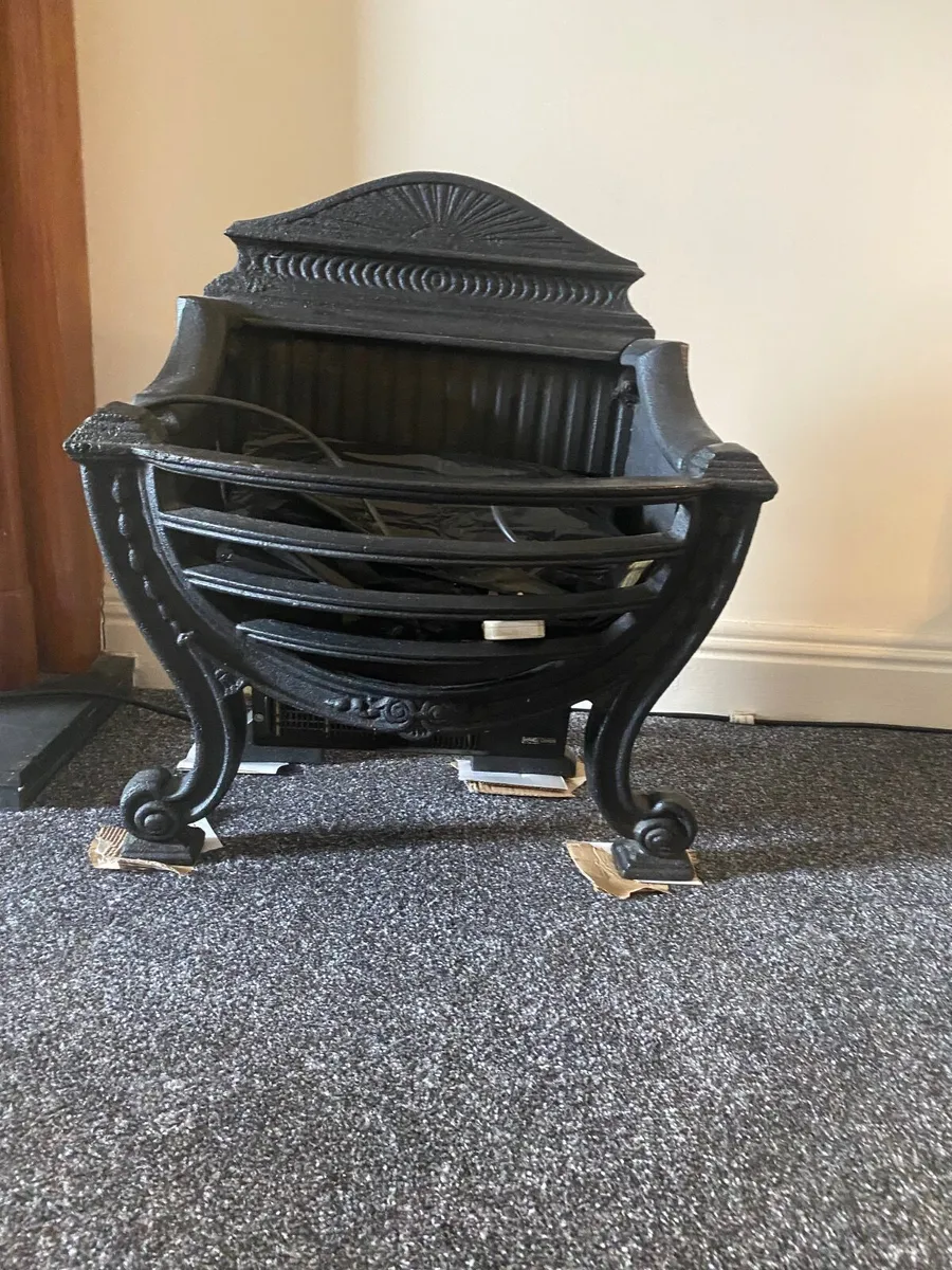 Cast Iron fire grate .50  euro