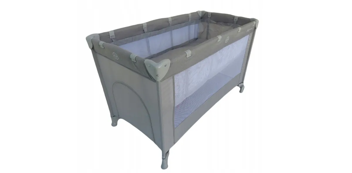 Cot bed with newborn insert - Image 1