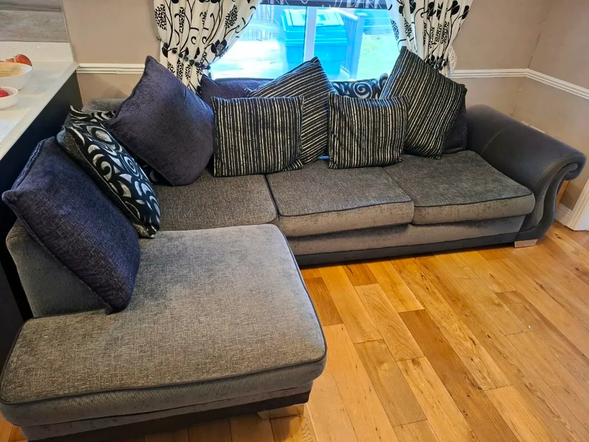 Large corner sofa in charcoal grey and black. - Image 3