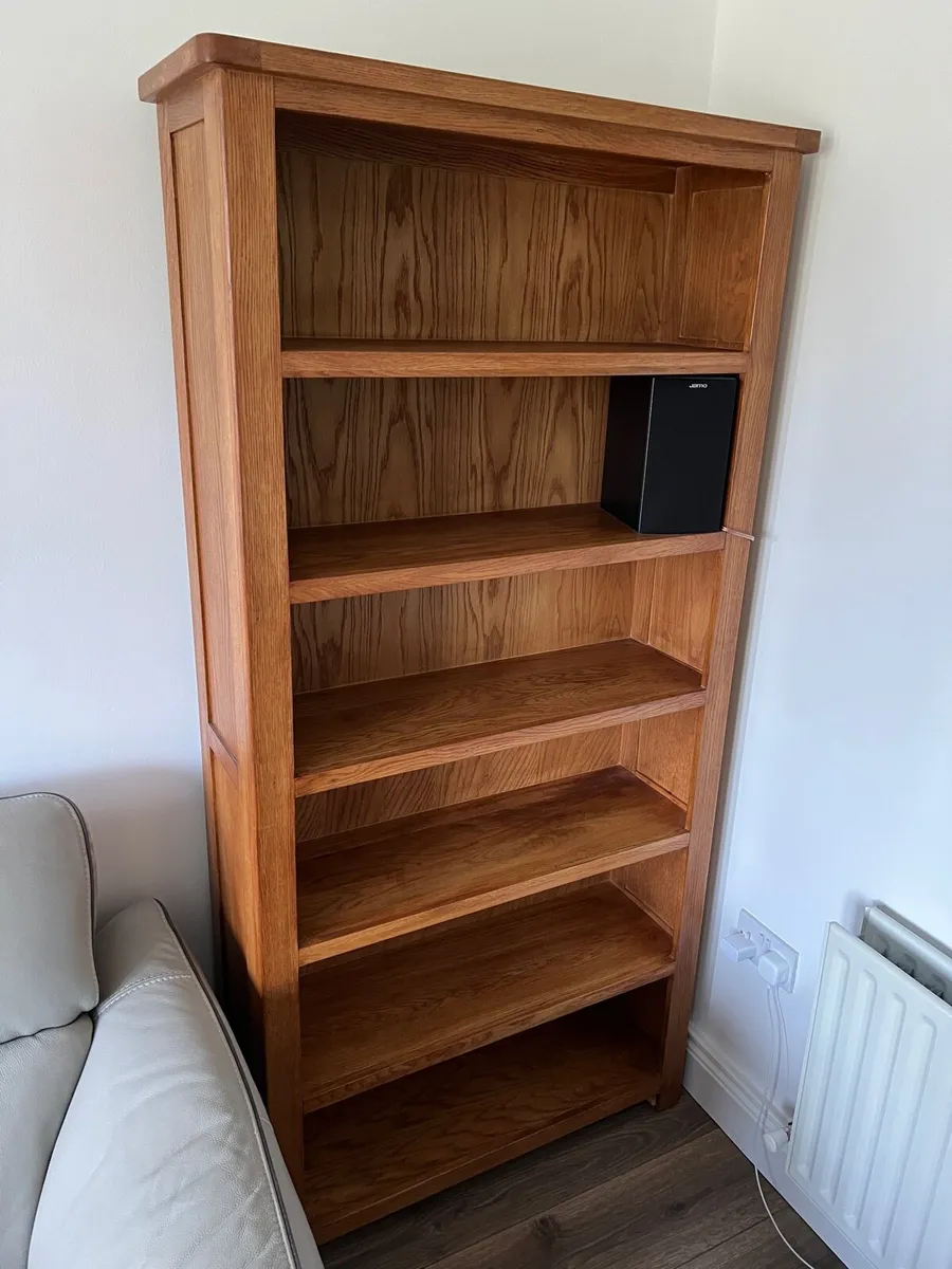 Tall Bookcase, Rack Coat, Large Paintings, Lantern - Image 1
