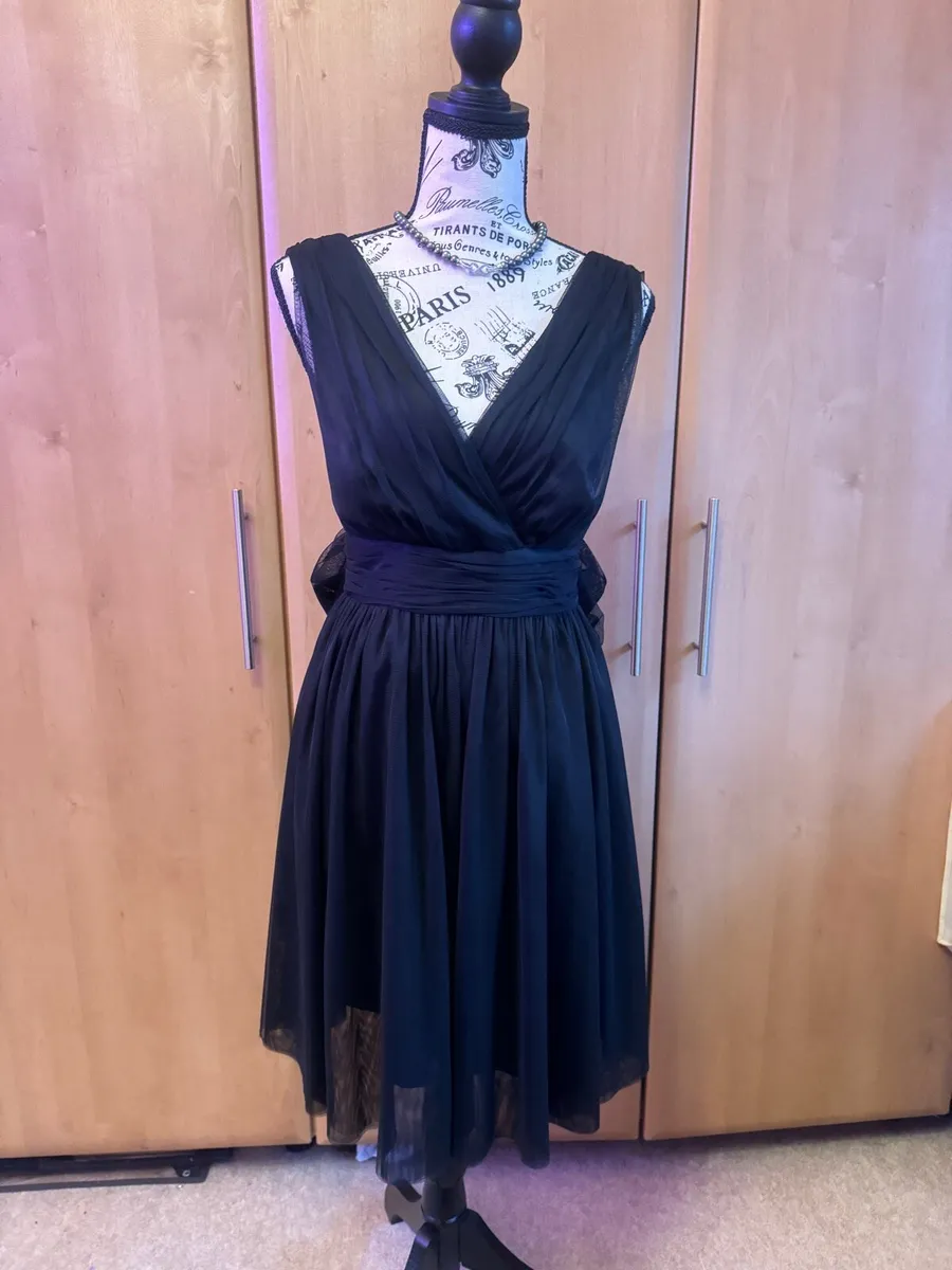 Black v-neckline dress for sale - Image 1