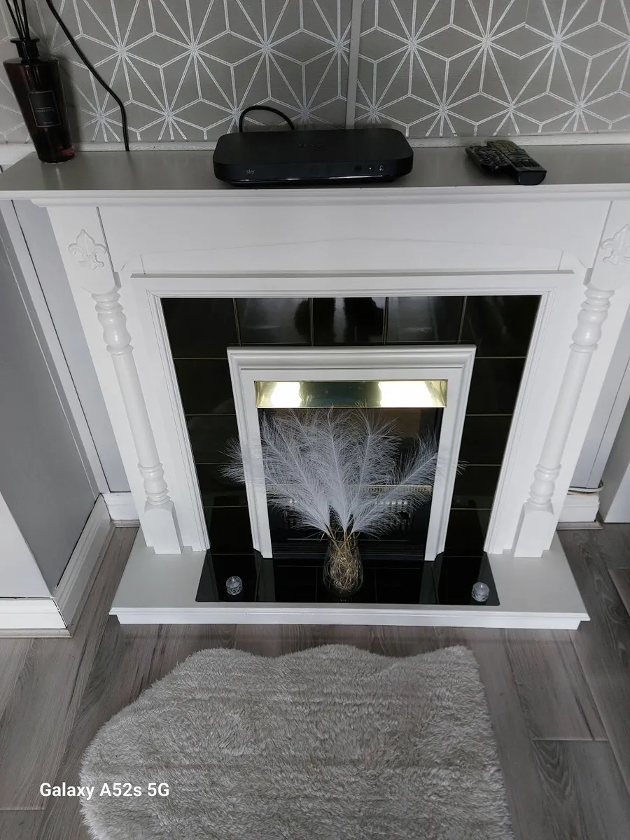 Fireplace with electric fire