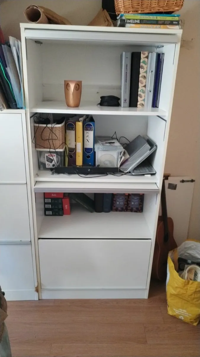 Minimalist white storage units. - Image 2