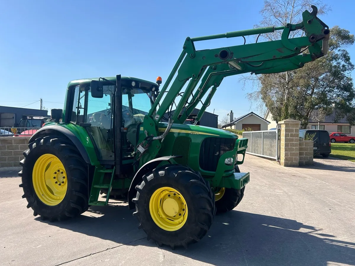 John Deere 6520 + loader - Image 1