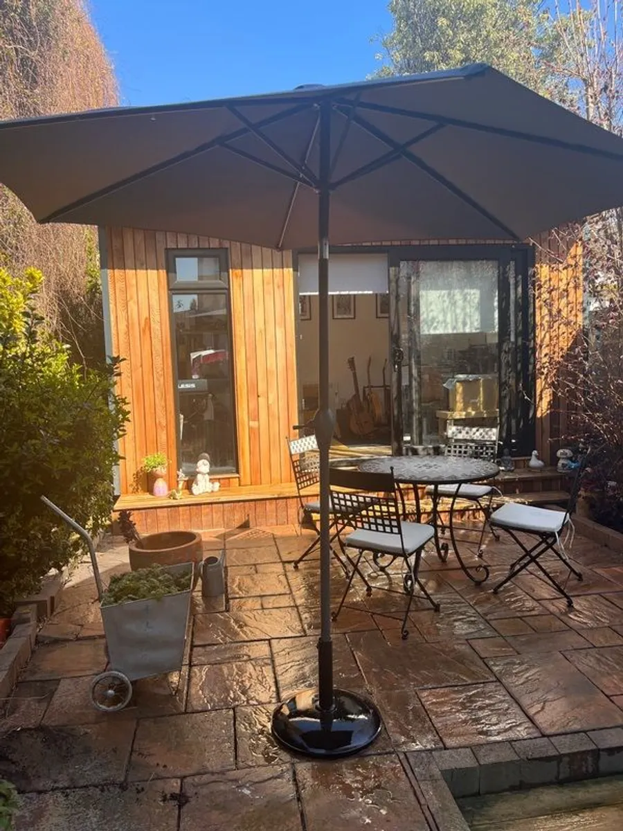 Quality parasol with base.Purchased at Arboretum. New and hardly used. - Image 2