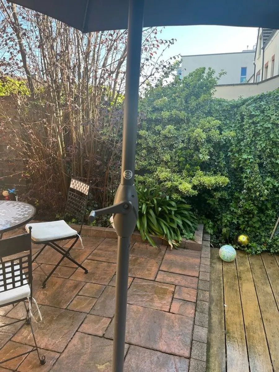 Quality parasol with base.Purchased at Arboretum. New and hardly used. - Image 3