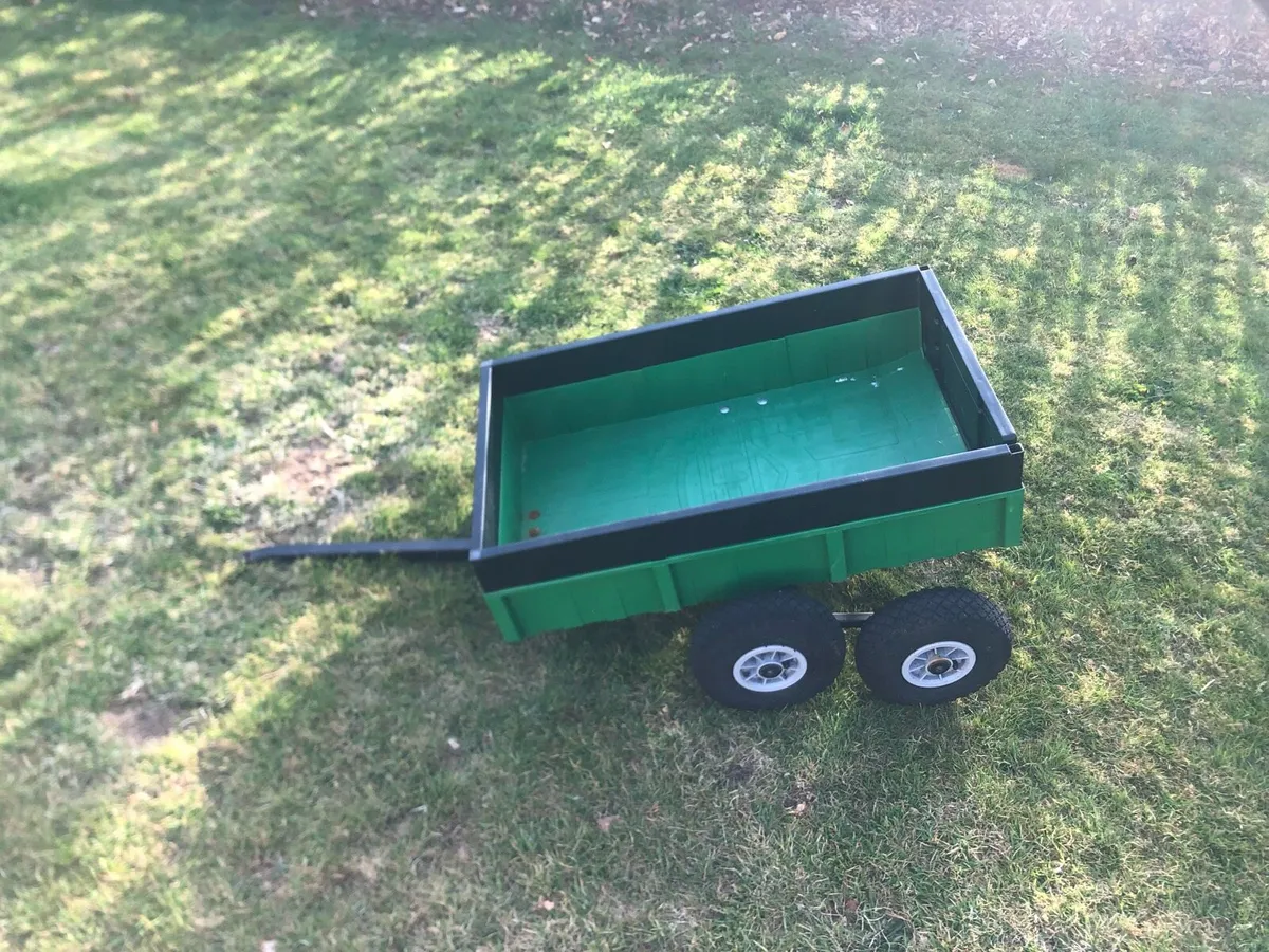 Berg trailer in mint condition.Goes with tractor