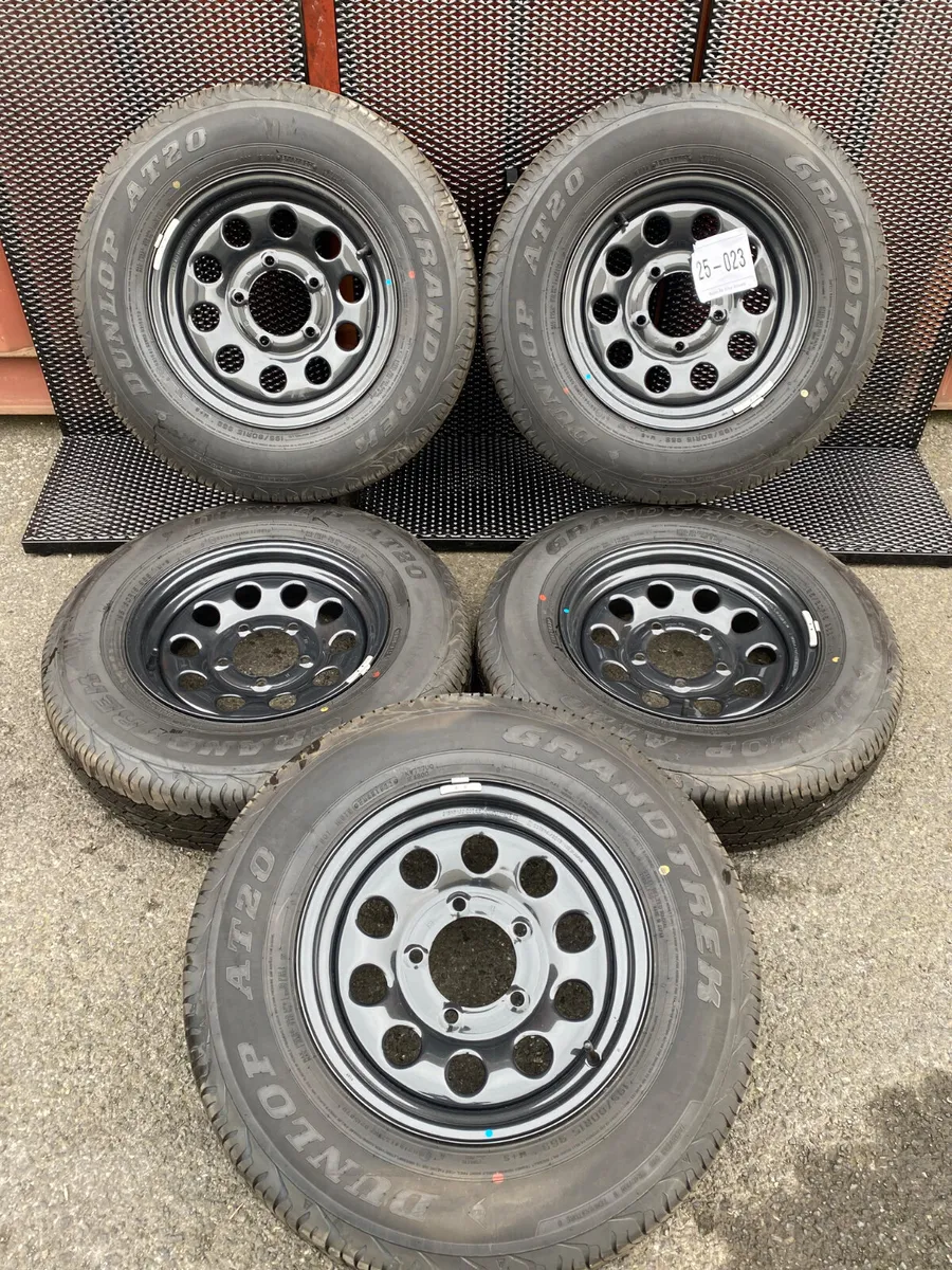 Suzuki jimny 15 inch wheels new tyres ref 25-023 - Image 1