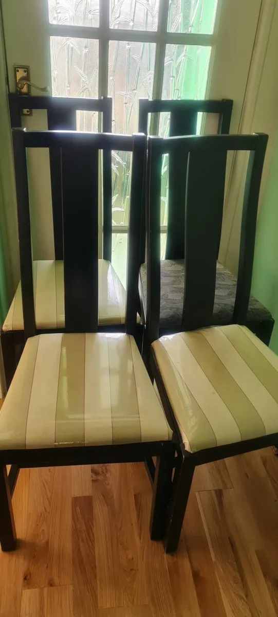Four solid chairs