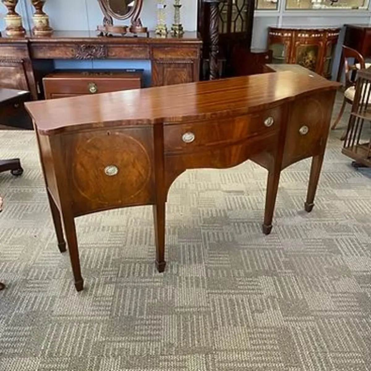 Fabulous serpentine bow front mahogany sideboard