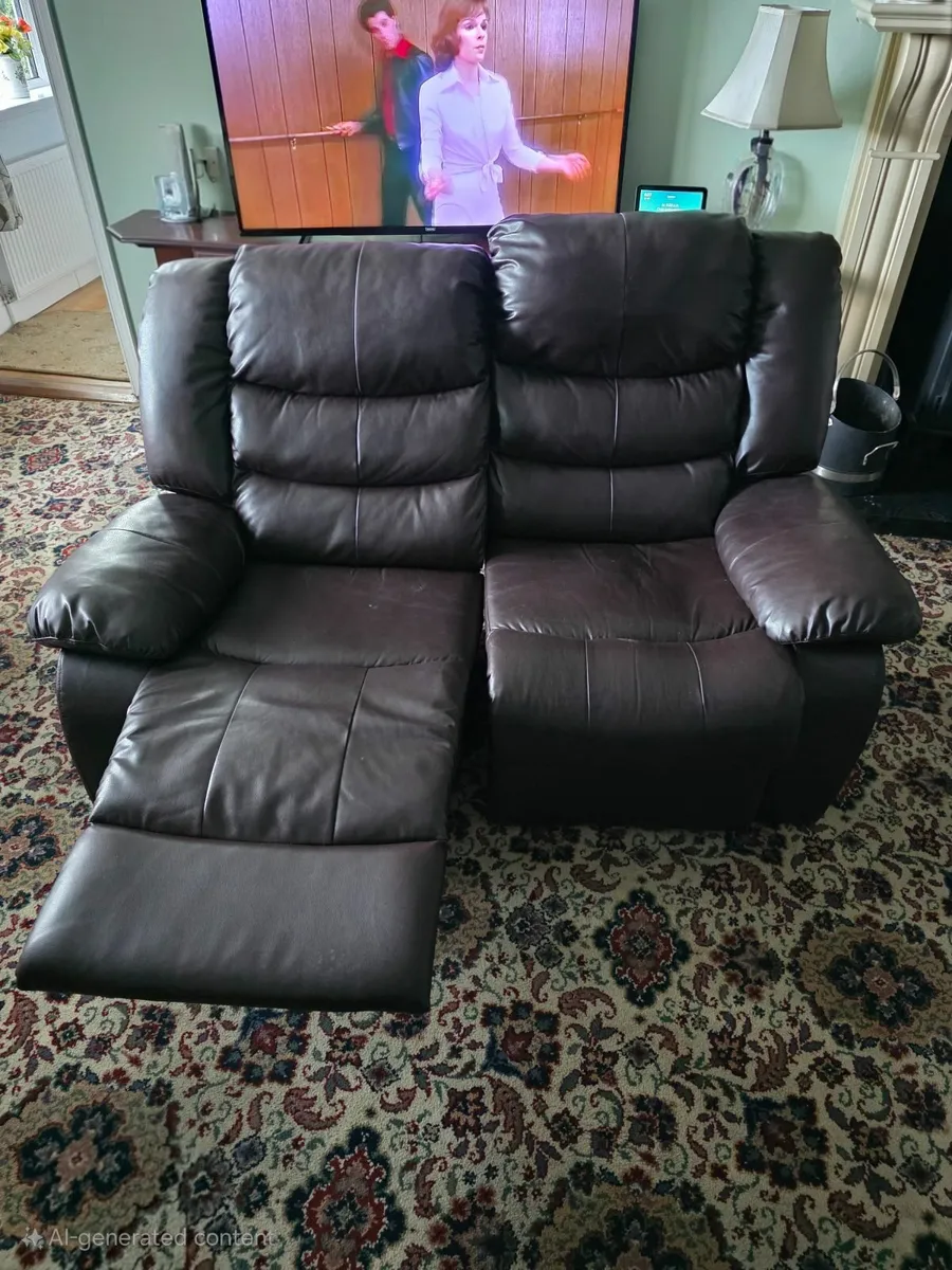 Luxurious Reclining Leather Loveseat Sofa - Image 1
