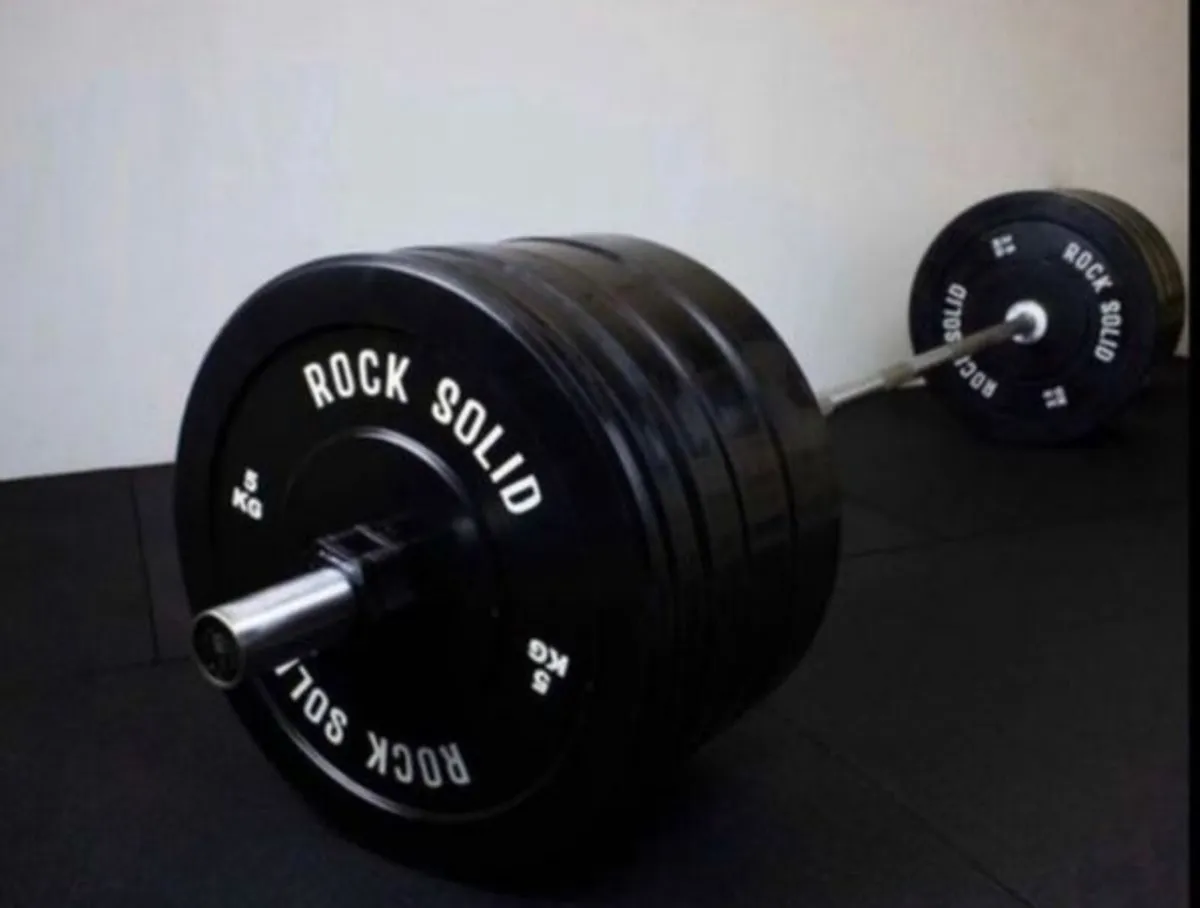Olympic Barbell + weight plates 127.5kg (new) - Image 1