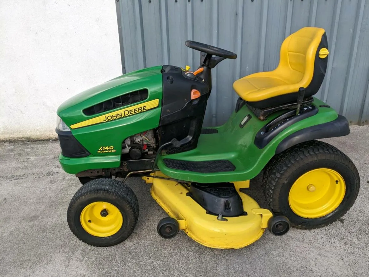 Lawnmower John Deere tractor x140 48" deck - Image 1