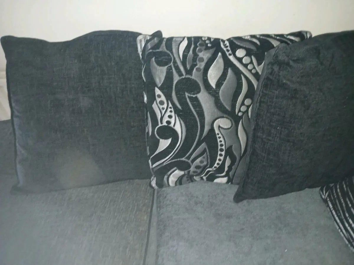 Black and dark grey corner sofa. With stool - Image 4