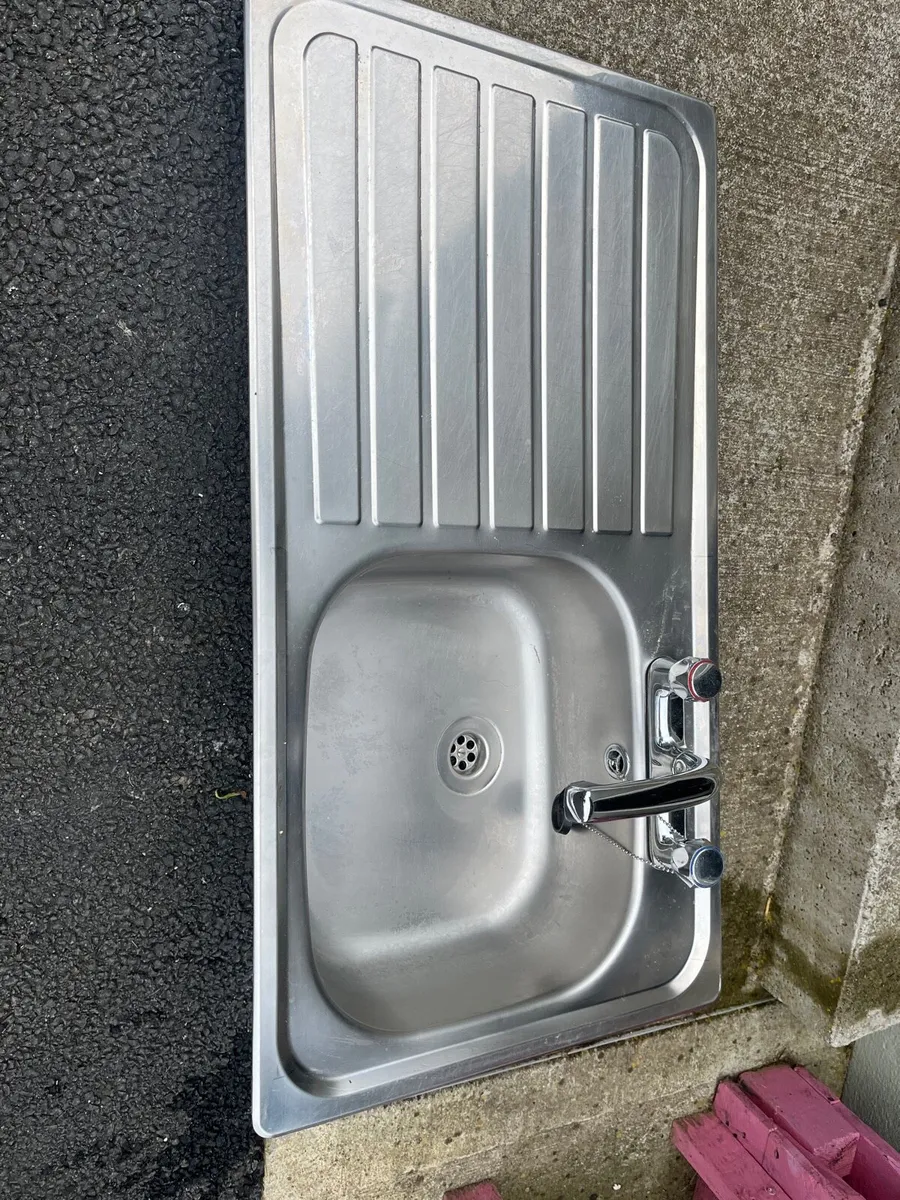 Kitchen sink and taps