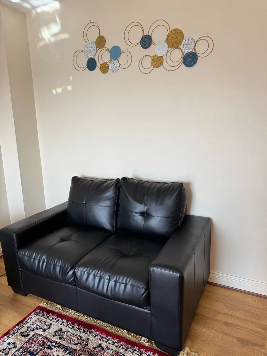 2 seat leather and 2 seat normal sofa to sell - Image 1