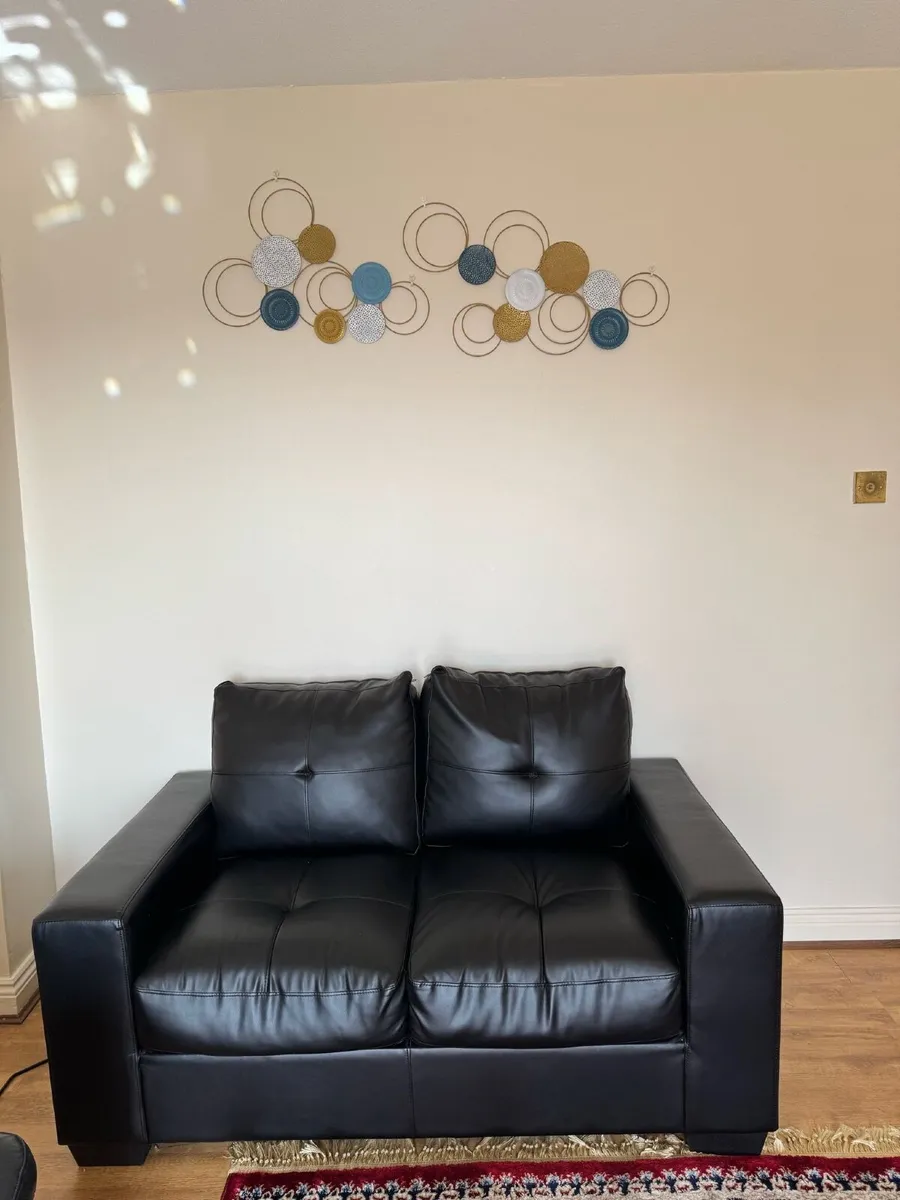 2 seat leather and 2 seat normal sofa to sell - Image 2