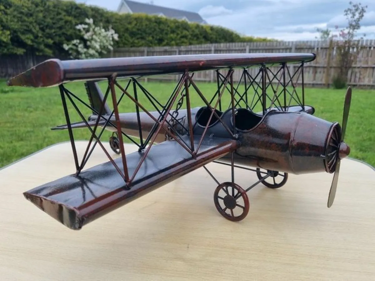 Large metal model of a vintage airplane - Image 1