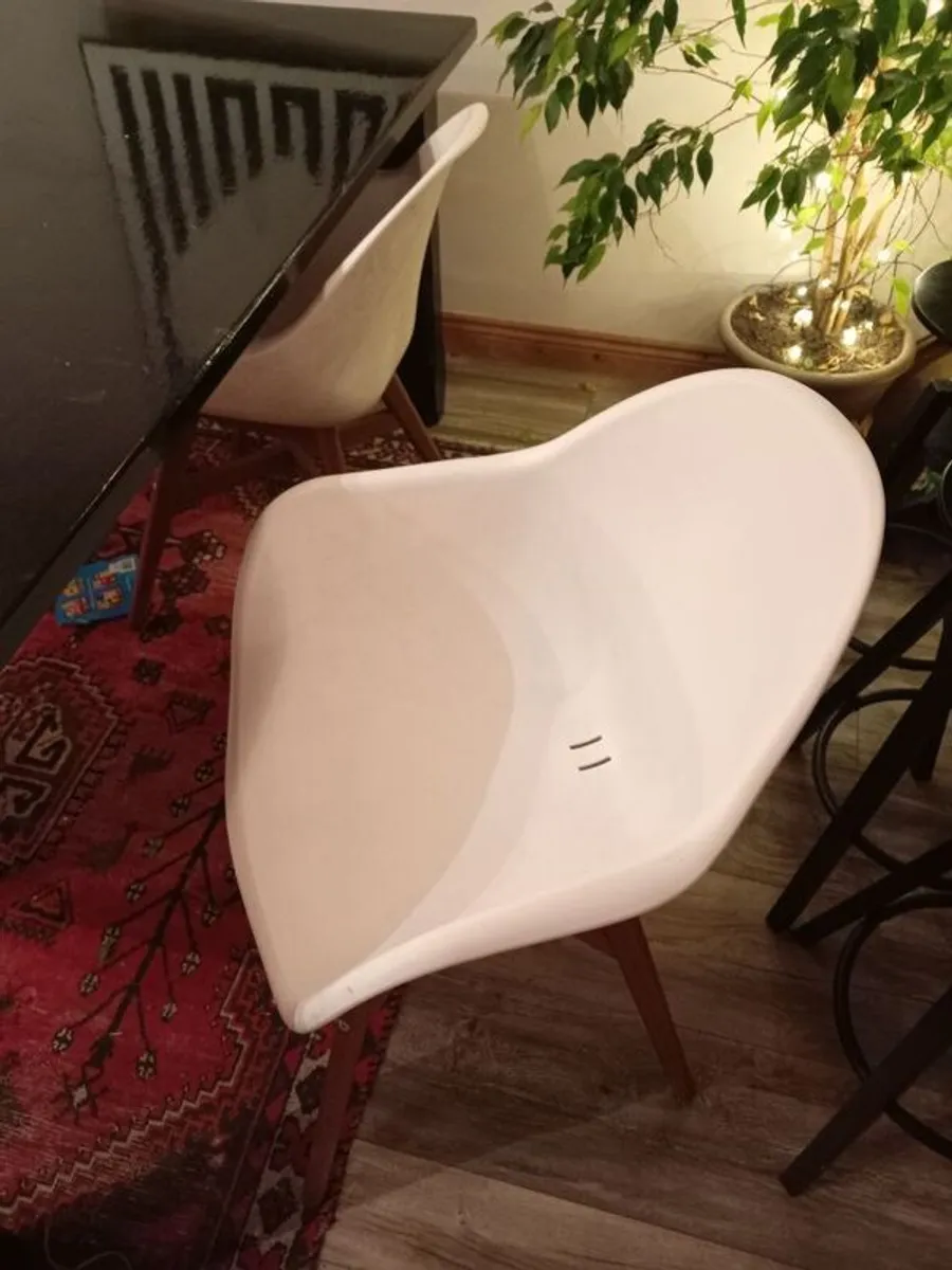 Heavy black painted wooden dinner table and four white chairs - Image 2