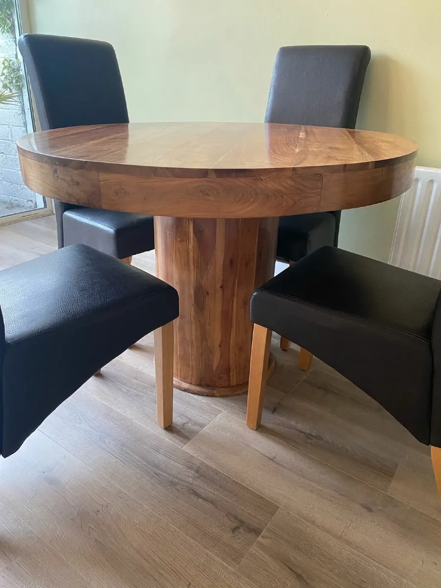 Solid wooden dining table - Image 1