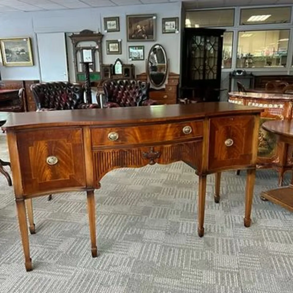 Fabulous mahogany Georgian style serpentine bow fr