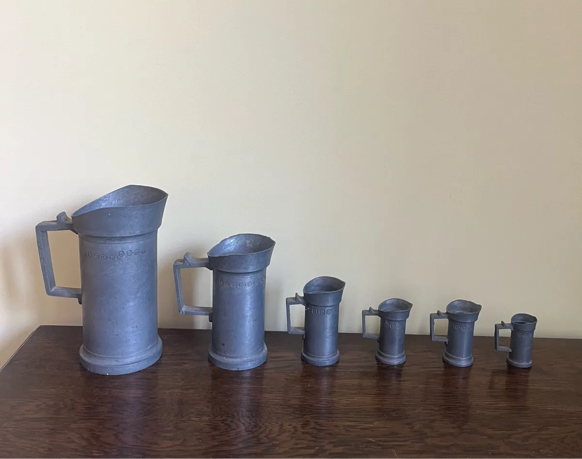 Set of Graduating Pewter Tankards - Image 1