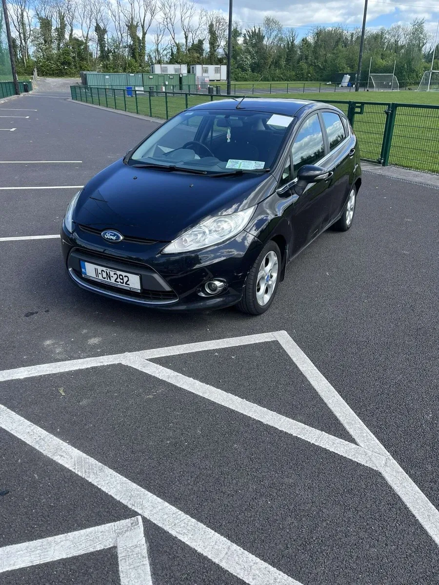 2011 Black Ford Fiesta - Image 1