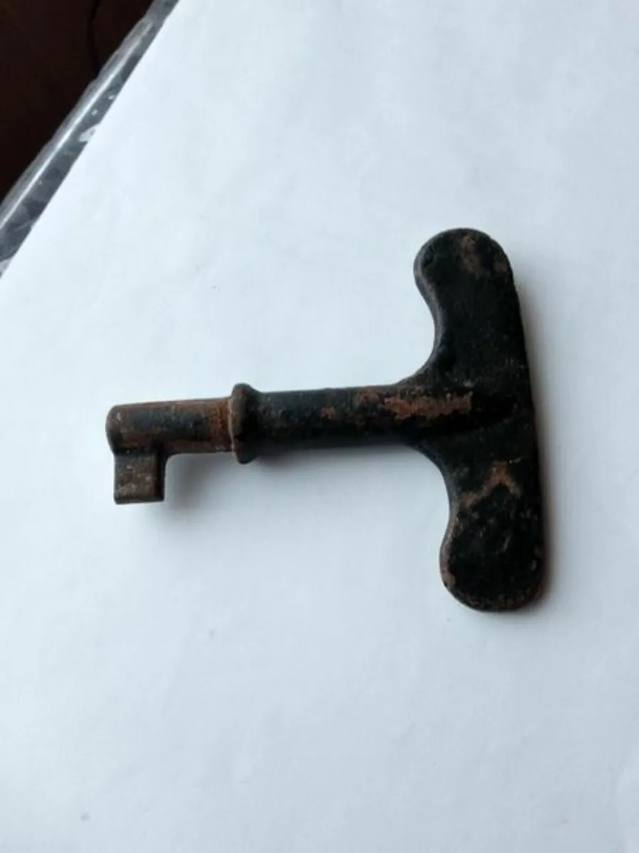 Antique iron wall safe key