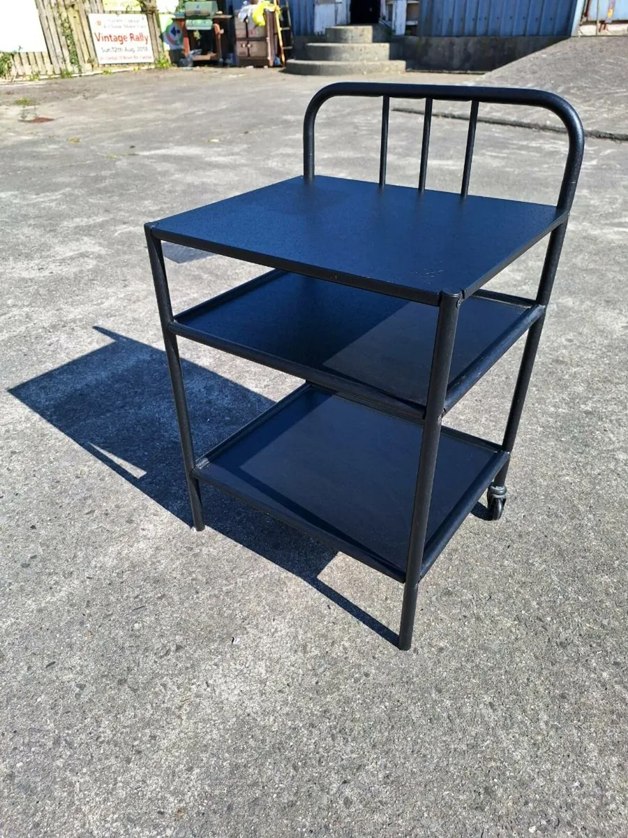 Small black metal trolley
