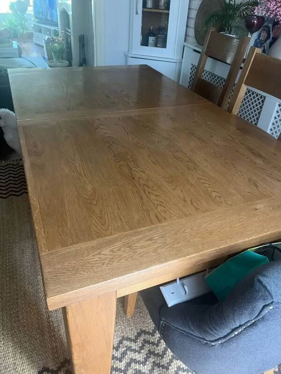 Solid wood dining table - Image 1