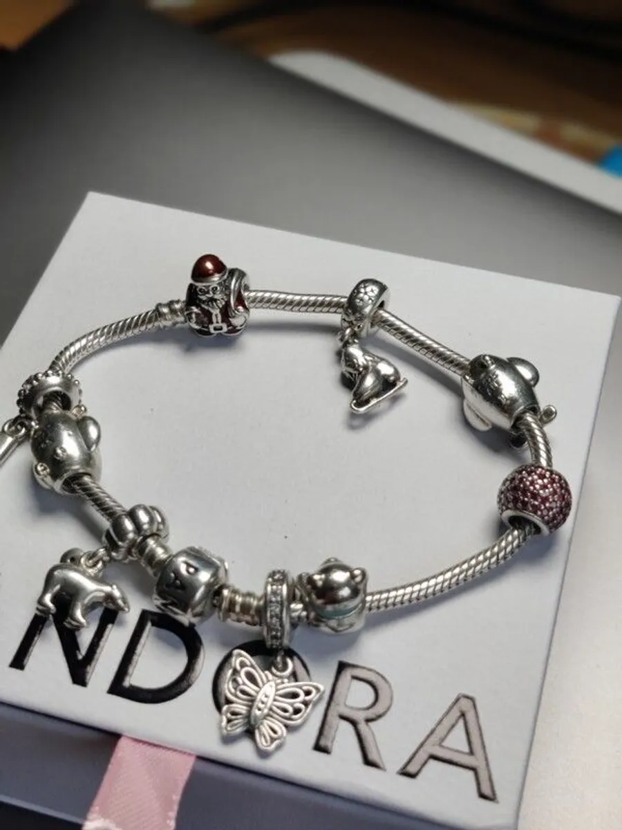 Certified Pandora charm bracelet 9 charms - Image 1