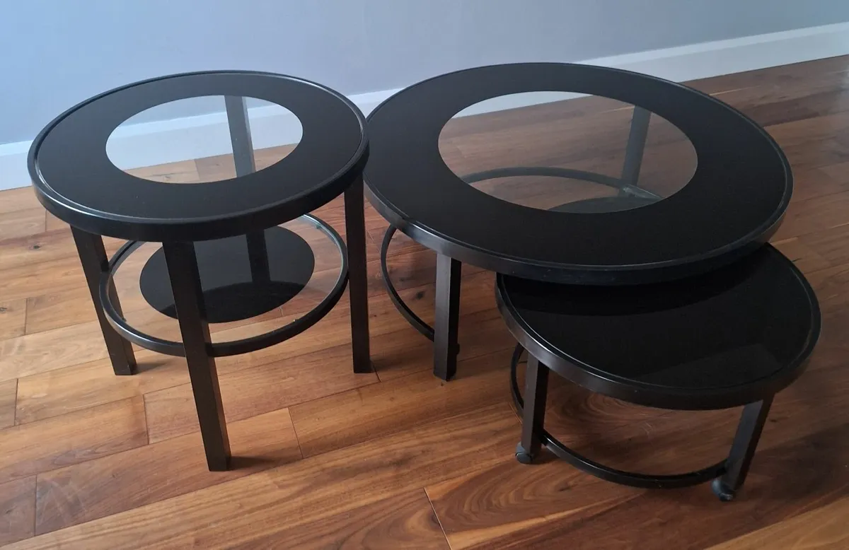 Triplet of neat round tables with glass tops - Image 1