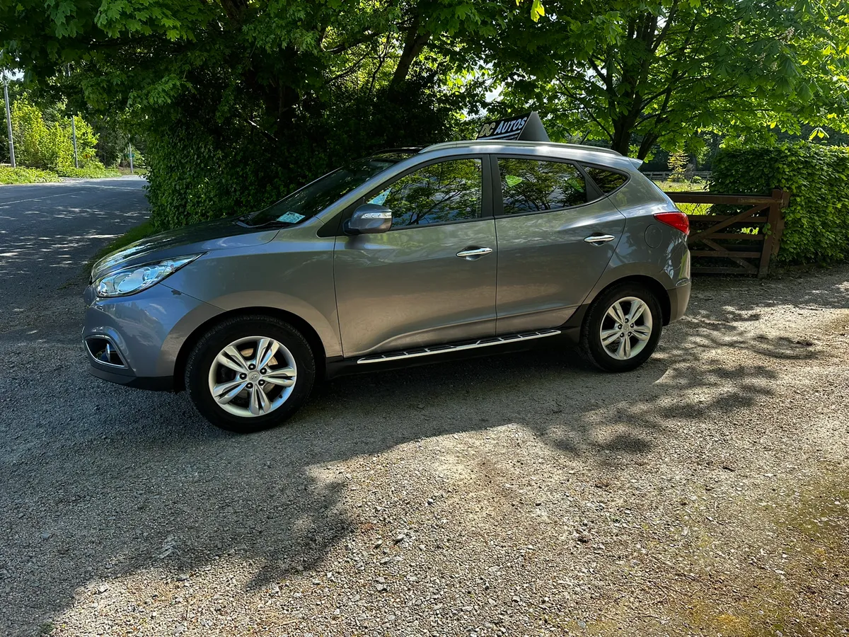 12 HYUNDAI ix35 - Image 4